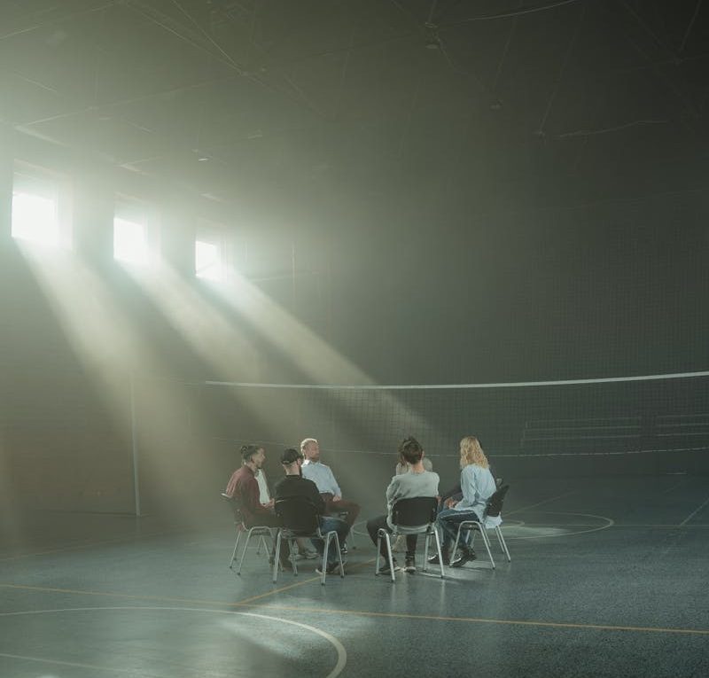 Group of People Sitting on Chair